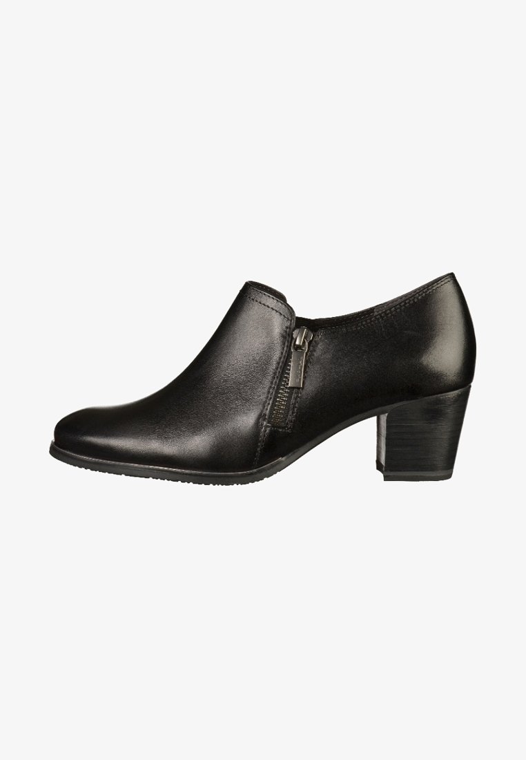 Chaussure pour femme en cuir noir, à talon bas, avec fermeture éclair latérale, bout rond, finition lisse, et talon bloc empilé.