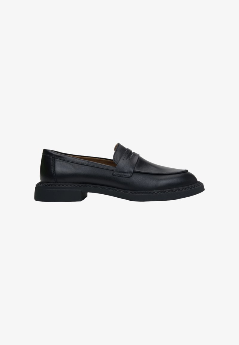 Black leather men's loafer with a low heel and decorative strap across the top, shown in side profile on a white background.