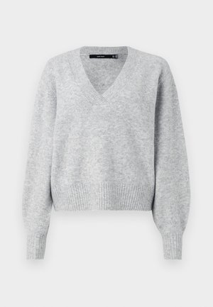 Grå strikket genser med V-hals, lange pufferm og ribbestrikket kant. Myk tekstur med en litt løs passform, ideell for lagdeling.