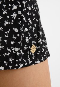 Superdry & Co Combinaison - black