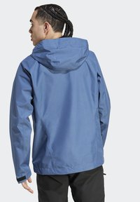 adidas Terrex XPR GORE PAC JJACKET - Giacca hard shell - blue