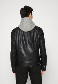 Gipsy by Mauritius BARLO - Casaco de couro - black