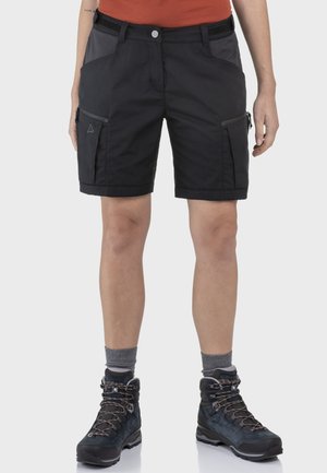 Schwarze Wandershorts mit einem Reißverschlusstasche, hergestellt aus einem strapazierfähigen Stoff. Verfügt über einen Bund mit Knopf und dezente seitliche Akzente.