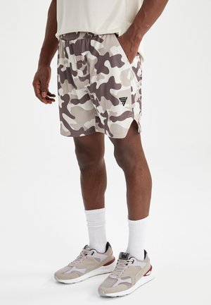 SLIM FIT - Krótkie spodenki sportowe - beige