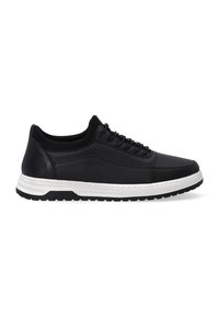 Black athletic shoes with a smooth leather upper, mesh accents, and a white midsole. Features a rounded toe and rubber sole. Laced design.