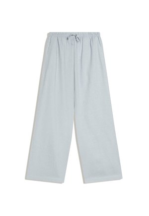 Pantalon large gris clair avec taille élastique et lien ajustable, avec poches latérales, présenté à plat sur fond blanc.