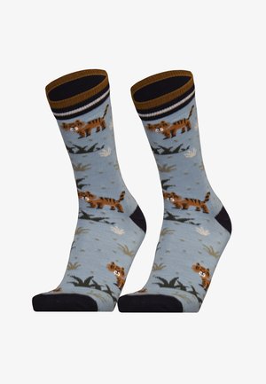 Cotton blend socks with a light blue background featuring playful tiger patterns. Brown striped cuff and black toe detail, soft texture.