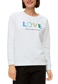 Felpa bianca con polsini e orlo a costine, caratterizzata da lettere in paillettes multicolori che formano la parola "LOVE" e una citazione stampata sotto.