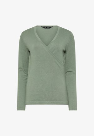 Groene lange mouwen sweater met een V-hals en wikkelontwerp. Gemaakt van een zachte stof, heeft het een subtiele textuur en een ontspannen pasvorm.