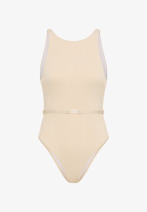 Costume intero beige con design ondulato strutturato, caratterizzato da accenti laterali bianchi e una cintura in vita con un dettaglio logo discreto.