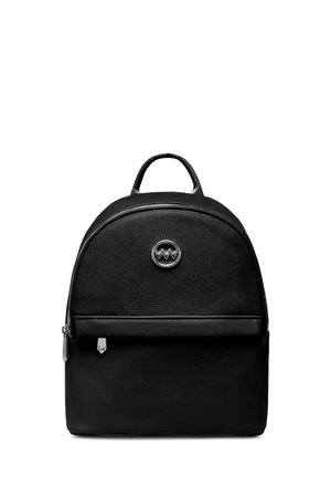 Black backpack with a rounded shape, made of textured material. Features a front pocket, logo accent, and a looped handle on top.