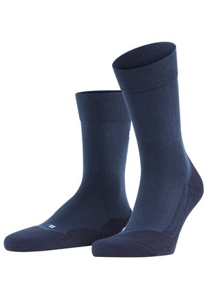 Marineblaue Baumwollsocken mit gerippten Bündchen und verstärkter Ferse. Sie verfügen über nahtlose Zehen und eine glatte Textur für Komfort und Langlebigkeit.
