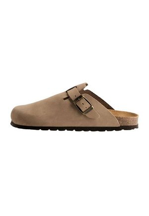 Brown suede clog with a single strap and metal buckle. Features a cork footbed and a textured rubber sole for grip.