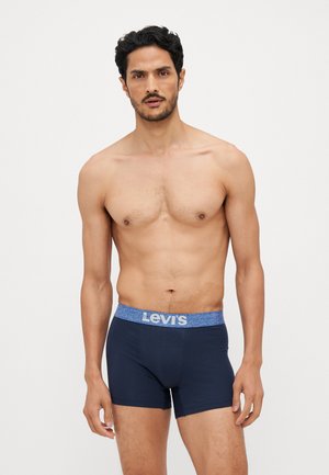 Die dunkelblauen Boxershorts für Herren von Levi's verfügen über eine weiche Textur, ein körpernahes Design und einen hellblauen elastischen Bund mit "Levi's"-Logo.
