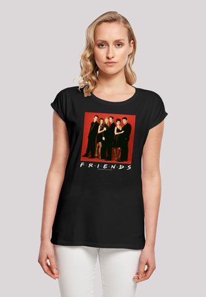 Black t-shirt featuring a front graphic of six characters framed in a red square, with the word "FRIENDS" in white text below the image.