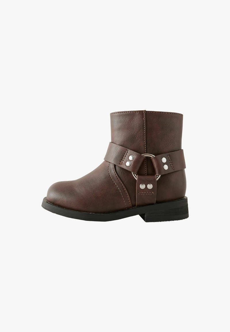 Brown leather ankle boot with a round toe, a wide strap featuring a circular buckle, and silver hardware accents on the side. Black rubber sole.