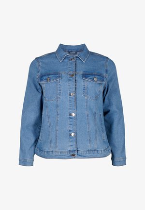 Heledsinine denimpusa klassikalise kraega, kahe rinna-taskuga ning ees nööpidega kinnitusega. Omab pikki varrukaid ja veidi voolavat lõiget.