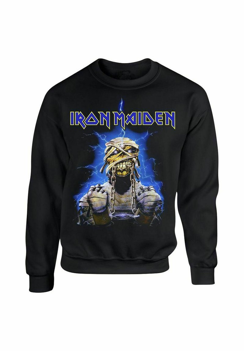 Sudadera negra con el logotipo "Iron Maiden" en amarillo. Gráfico central que muestra un personaje similar a una momia con cadenas sobre un fondo eléctrico azul.