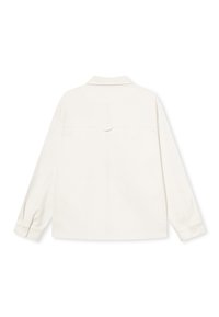 White long-sleeve shirt with a back yoke, button details on cuffs, and a smooth, soft texture. Simple design, no patterns or accents.