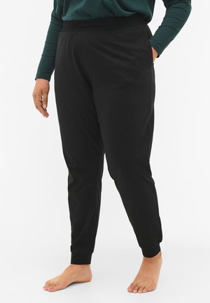 Black elasticated waist joggers with cuffed ankles, made from a soft material, featuring side pockets and a relaxed fit.