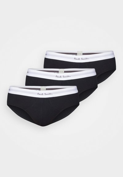 Chiloti negri din bumbac, cu talie elastică albă pe care este imprimat logo-ul "Paul Smith". Pachet de trei, cusături plate, textură netedă.