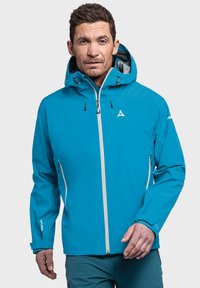 Blaue wasserdichte Jacke mit Kapuze, weißem Reißverschluss und verstellbaren Bündchen. Verfügt über zwei Seitentaschen und ein Logo auf der Brust und dem Ärmeln.