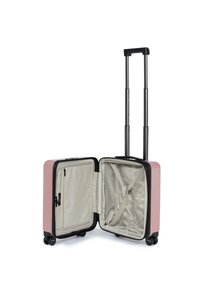 Valigia rigida rosa con finitura testurizzata, aperta per rivelare un interno beige, tasca con zip e cinghie di compressione. Manico telescopico e ruote.