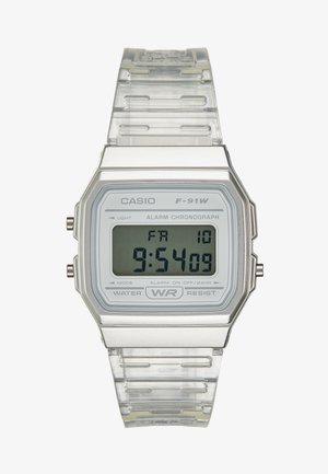 Orologio digitale da polso con cinturino in plastica trasparente, cassa in argento e quadrante rettangolare che mostra l'ora, l'allerta e le caratteristiche di resistenza all'acqua.