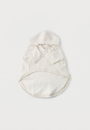 Hoodie i kremet bomull med hette, langermet, rundet kant og crossover-utsnitt. Myk tekstur med minimale designdetaljer.