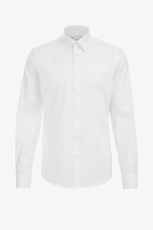 Vit långärmad skjorta i bomull med klassisk krage, med knappslå framtill och rundad nederkant. Enkel, slät textur.