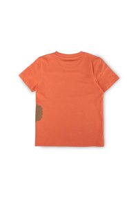Short-sleeve t-shirt in bright orange cotton, featuring a brown patch detail on the left side. Classic crew neck and standard fit.