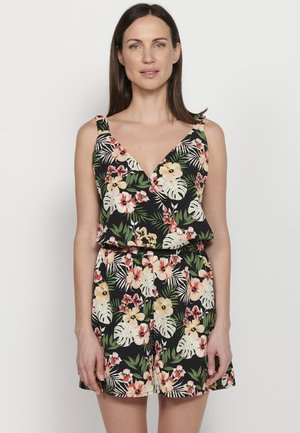 Robe courte à fleurs avec une base noire ornée de fleurs blanches, jaunes et roses, décolleté en V, et bretelles larges ; coupe ample avec une taille froncée.