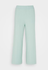 Lichte muntgroene wijde broek van ribstof, met een platte elastische tailleband en zonder zichtbare zakken of versieringen.