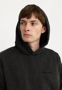 REVOLUTION Hoodie - black
