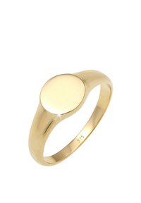 Gouden ring met een gladde, ronde bovenkant met een reflecterend oppervlak, gezet op een gepolijste band. Markeringen omvatten "375" die de goudzuiverheid aangeven.