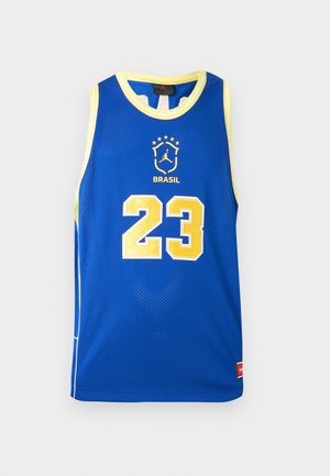 Modrý basketbalový dres so žltým lemom, číslo 23 v žltej farbe a emblém Brazílie s piatimi hviezdami nad ním na hrudi.
