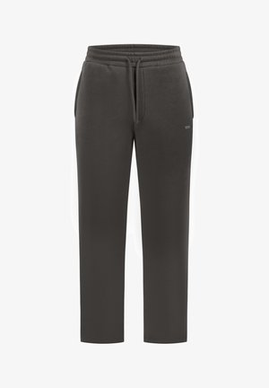 Tmavě šedé tepláky z měkkého materiálu, s elastickým pasem se stahovací šňůrkou a bočními kapsami. Jednoduchý střih s rovnými nohavicemi.