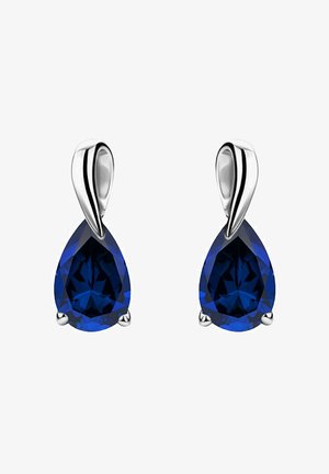 Teardrop earrings featuring deep blue gemstones set in polished silver. The design includes smooth, curved accents and four prong settings.