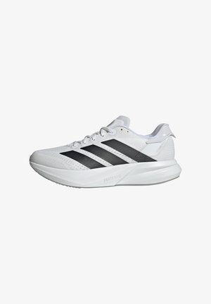 White athletic shoes with a breathable mesh upper, featuring three black stripes, a lightweight design, and textured sole for grip.