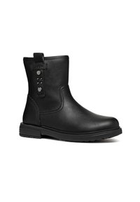 Botas de tobillo de cuero negro con un acabado suave, tachuelas laterales y una pestaña de bucle para ponerlas y quitarlas fácilmente. Suela plana con un ligero relieve para mayor agarre.