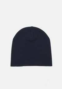 Marine strikkehætte med en blød tekstur, rund top og sømløst design. Velegnet til afslappet brug i koldt vejr.