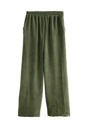 Žalios kordūrovo plataus kirpimo kelnės su elastingu juosmeniu, pasižyminčios vertikaliu raukšlėtu tekstūru ir šoninėmis kišenėmis.