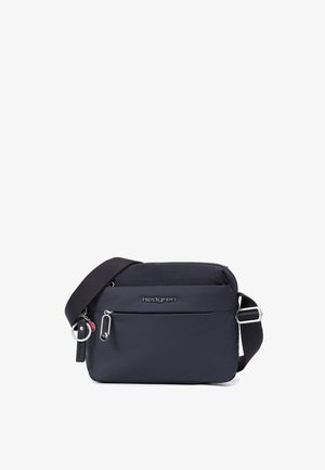 Sac bandoulière compact bleu foncé avec sangle noire réglable, poche avant zippée et logo Hedgren sur le panneau avant.