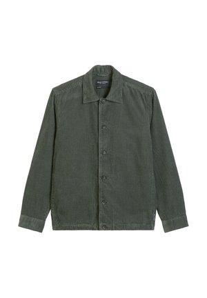 Olivgrüne Cordjacke mit Knopfleiste, spitzem Kragen und langen Ärmeln, die eine dezente Rippstruktur und seitliche Etikett-Details aufweisen.