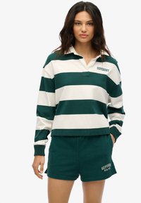 Superdry ATHLETIC ESSENTIALS GRAPHIC - Jogginghose - dark pine green