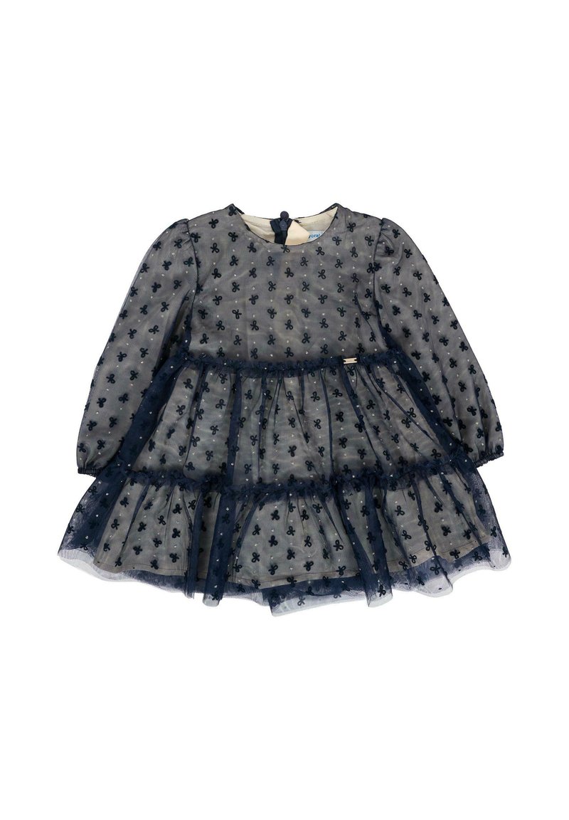 Granatowa sukienka dla małej dziewczynki z długimi przezroczystymi rękawami, warstwową falbaną i małymi wzorami w kokardki na całej powierzchni.