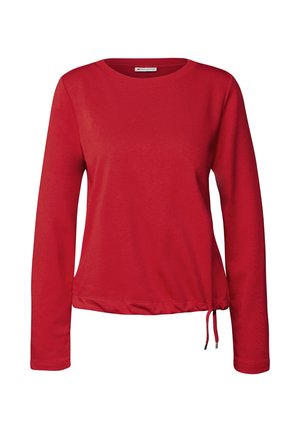 Haut rouge à manches longues avec un col rond. Présente un ourlet froncé avec un cordon de serrage ajustable d'un côté. Fabriqué en tissu doux.