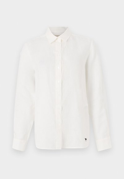 White linen long-sleeve shirt with a button-down collar, featuring a front button placket and a small black accent logo on the lower hem.