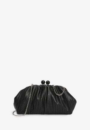 Black woven clutch bag with silver chain strap and round black clasp closure, displayed on white background.