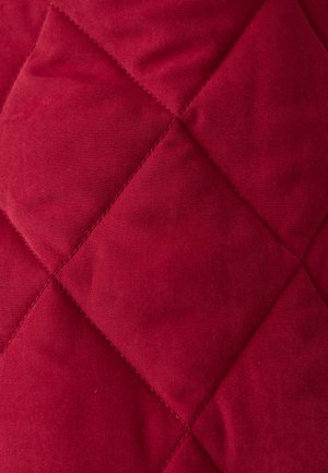 Red quilted fabric featuring a diamond pattern, smooth texture, and evenly spaced stitching, ideal for outerwear or blankets.